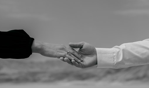 Husband and wife holding hands